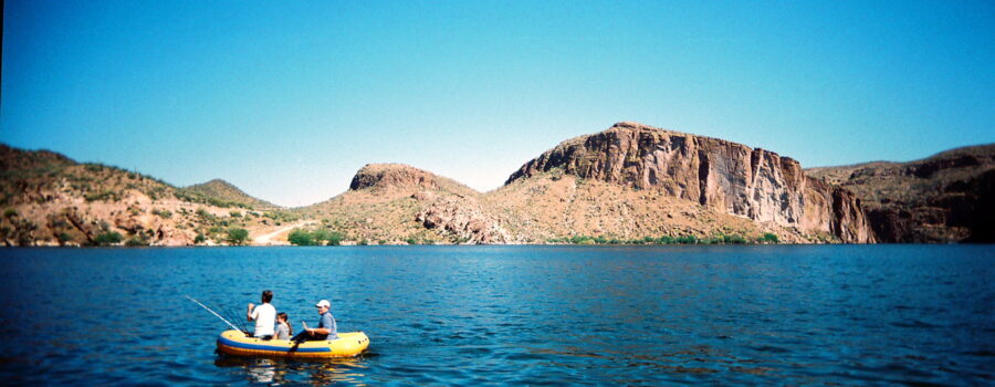 boys in boat in arizona