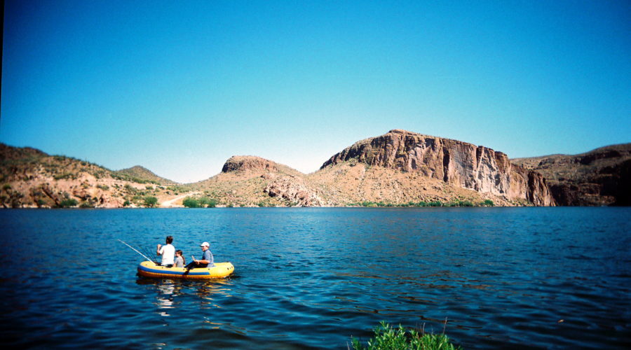 boys in boat in arizona